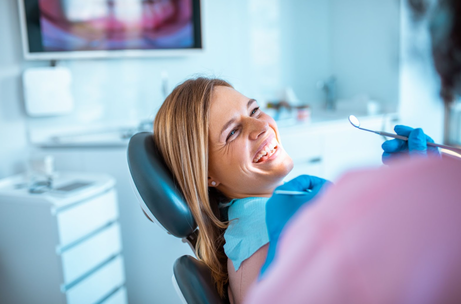 Smiling Patient in dental chair